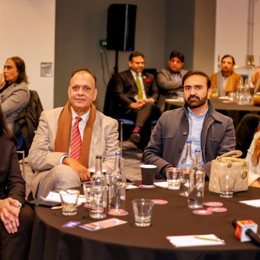 Panellists seated on stage