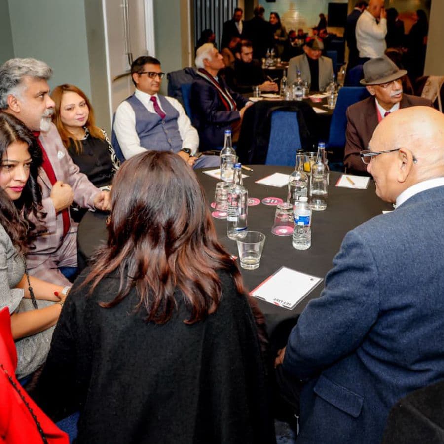 Delegates networking in the hall