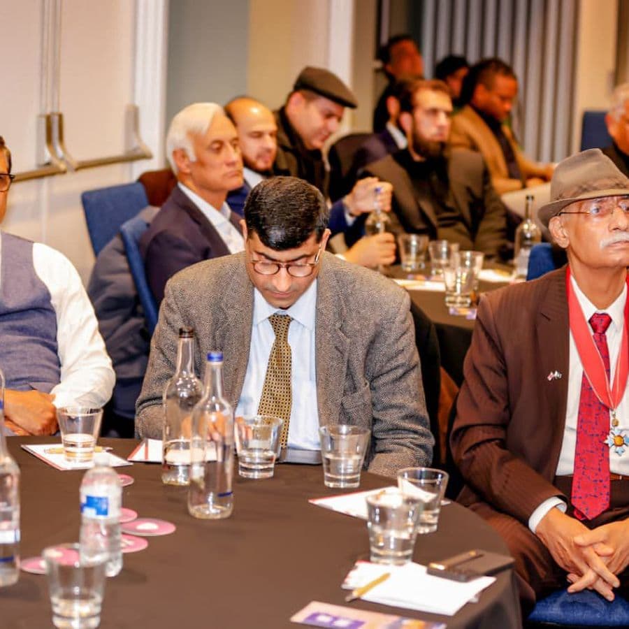 Delegates seated in the hall