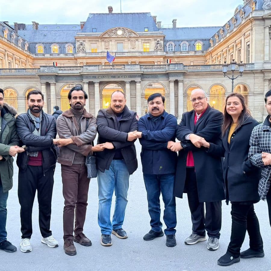 A delegation photographed outside the conference centre